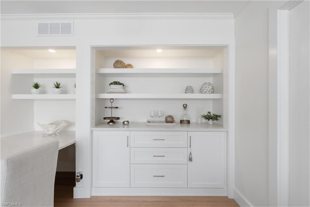 975 9th Avenue South, Unit 1 Naples, FL 34102 - Photo 21 of 34 a view of white cabinets