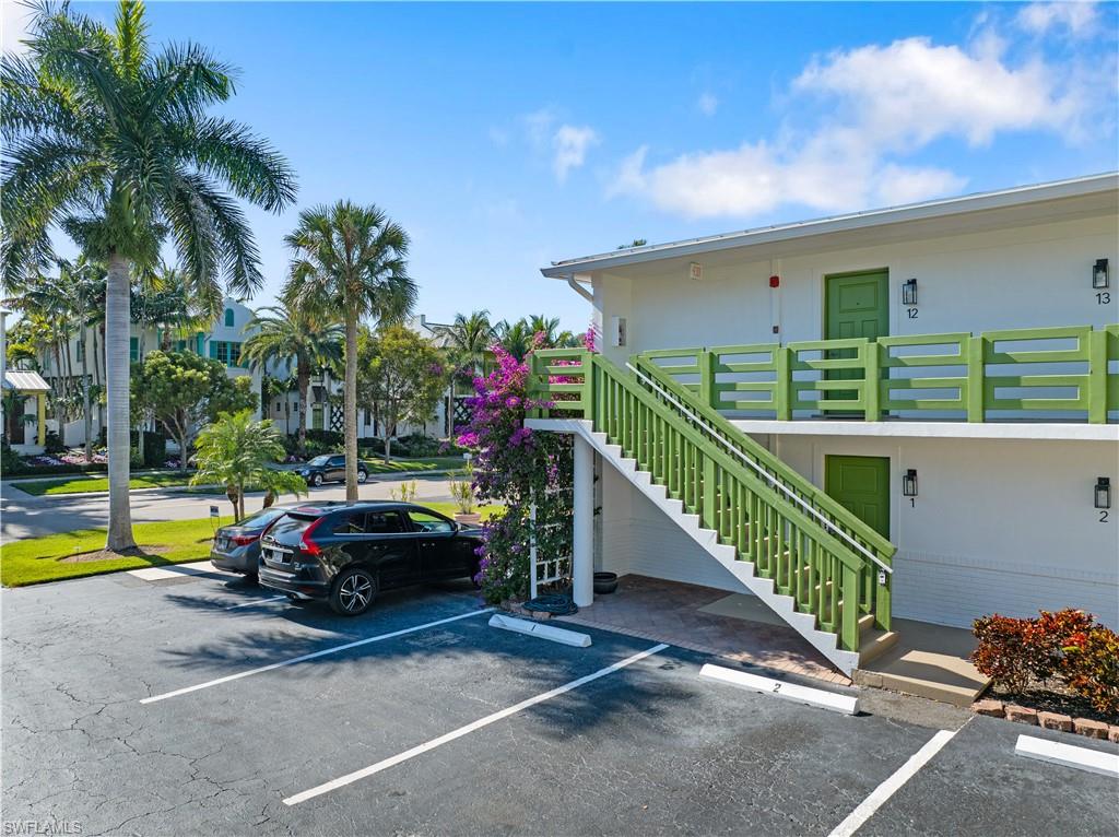975 9th Avenue South, Unit 1 Naples, FL 34102 - Photo 5 of 34 a view of house with swimming pool and furniture
