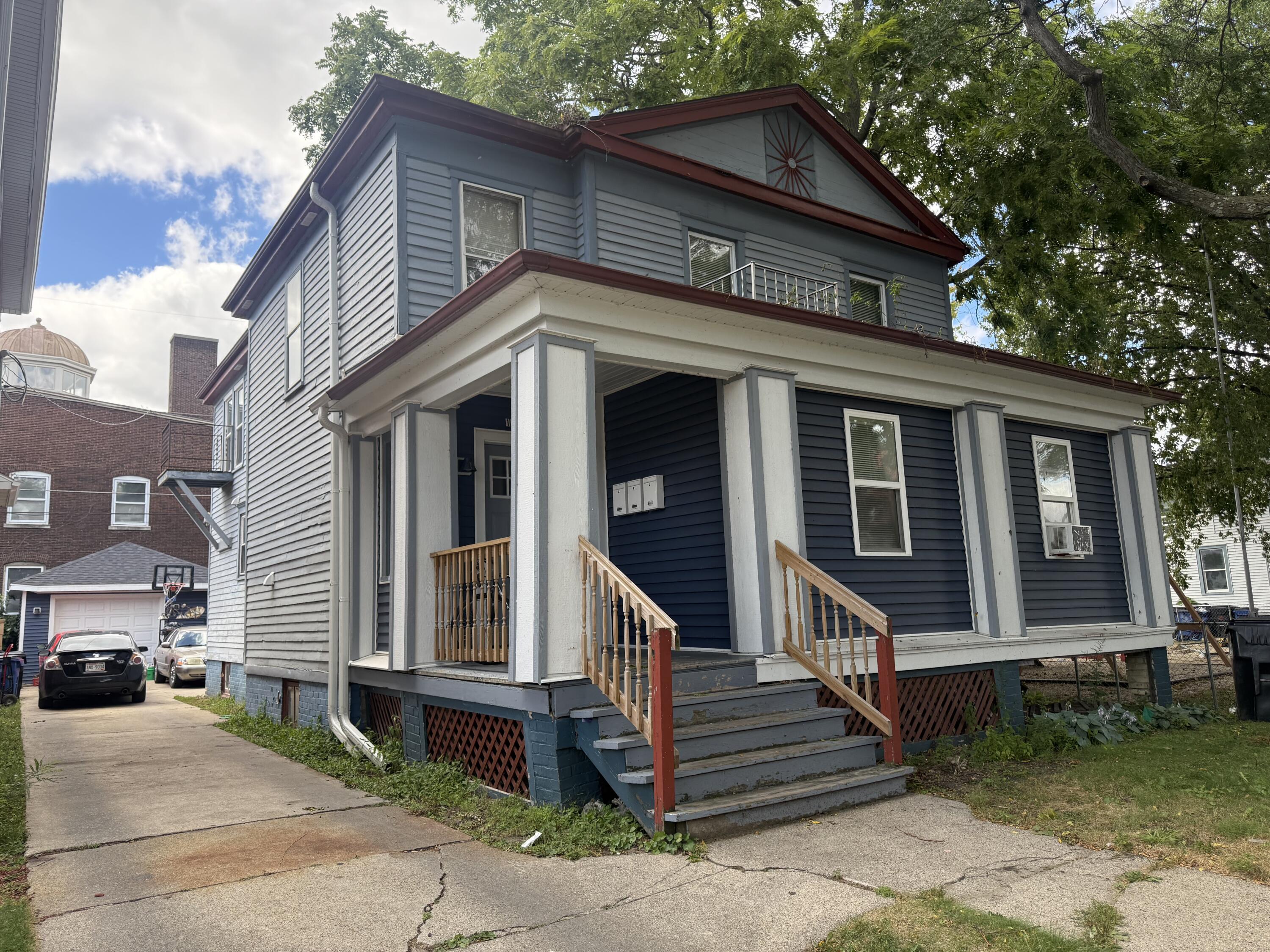1140 Wisconsin Avenue Racine, WI 53403 - Photo 1 of 1 Front View W Garage
