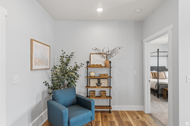 1343 North Trapper Loop Garden City, UT 84028 - Photo 14 of 56 Sitting room with light wood-type flooring and baseboards