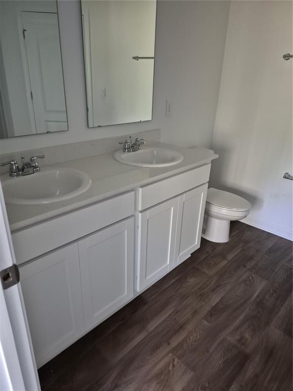 7 Ryall Lane, Unit B Palm Coast, FL 32164 - Photo 15 of 22 a bathroom with a sink and a toilet
