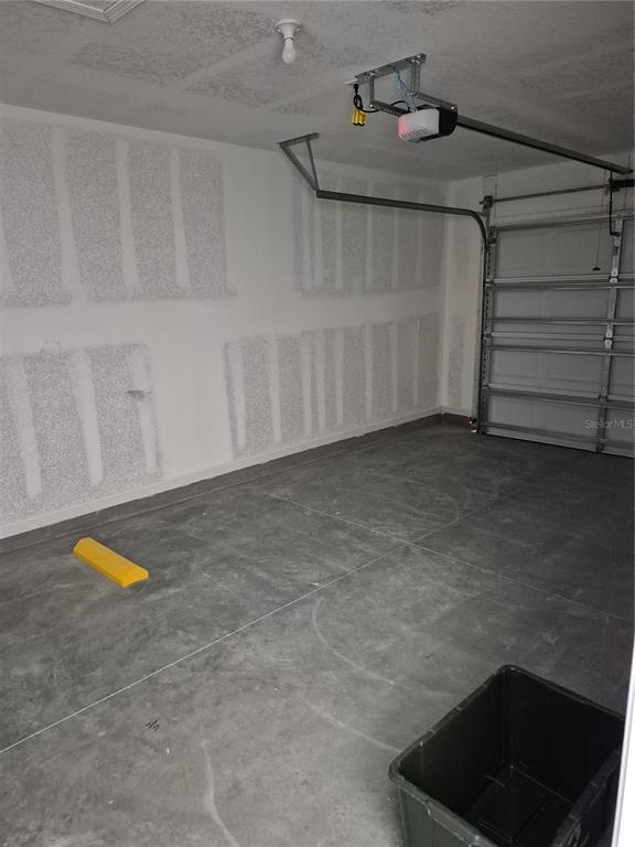 7 Ryall Lane, Unit B Palm Coast, FL 32164 - Photo 8 of 22 a view of a garage