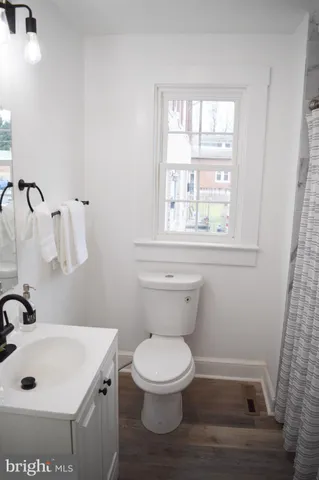 a bathroom with a shower and a bath tub
