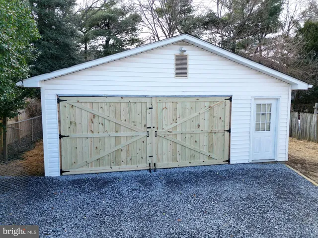 a view of backyard of house