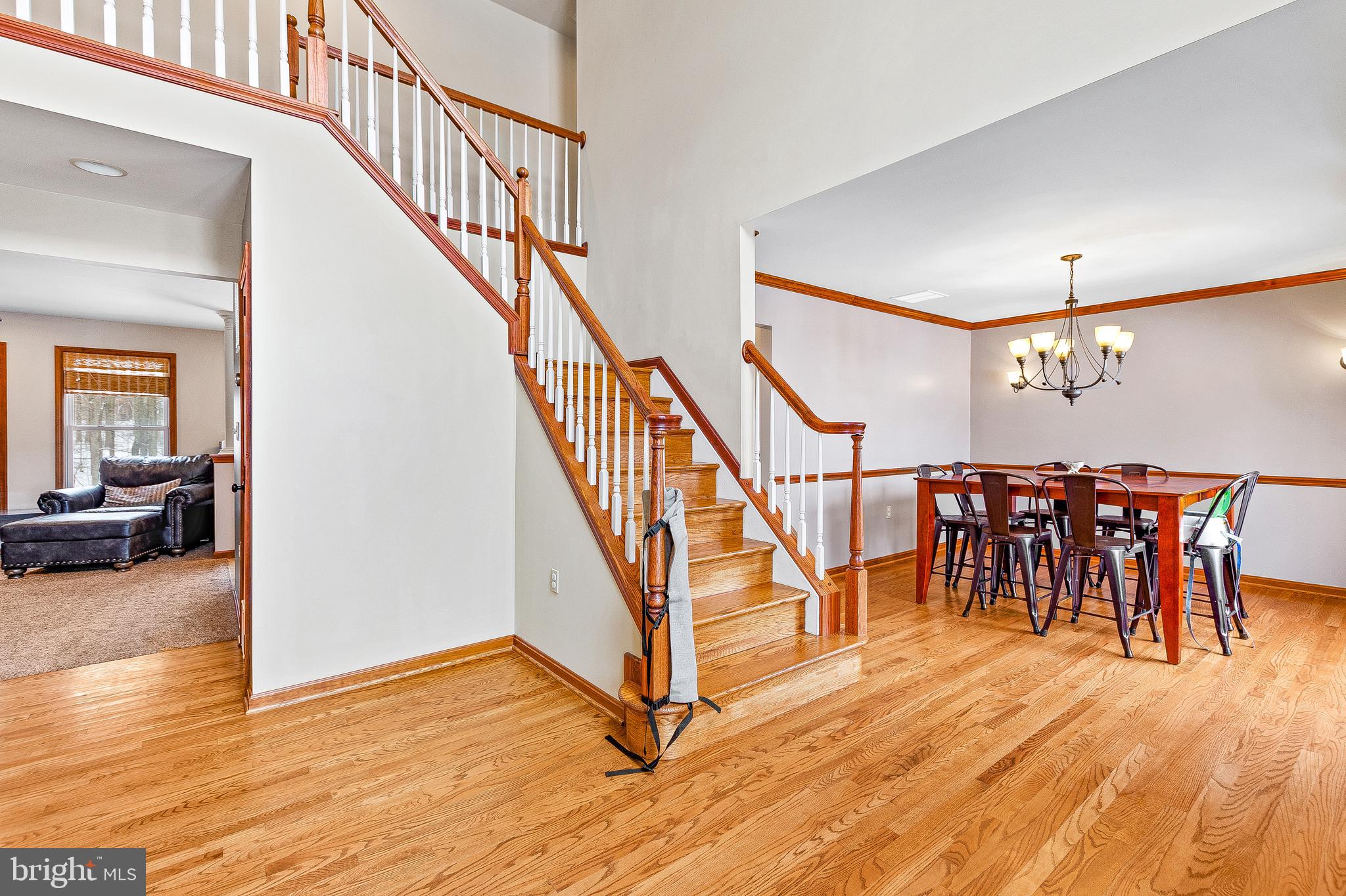 50 Walnut Creek Road Huntingtown, MD 20639 - Photo 11 of 59 Hardwood floors and stairs