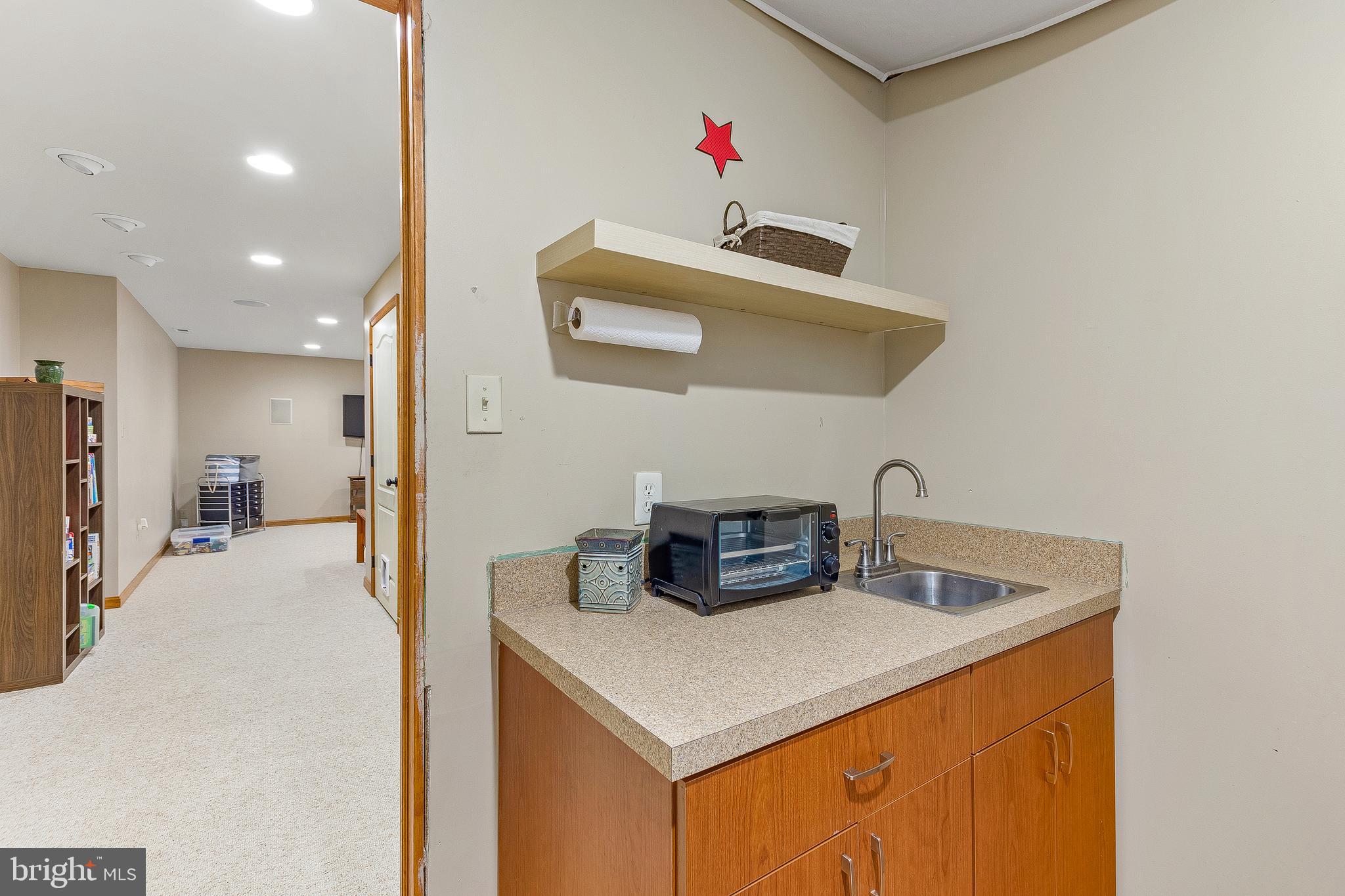 50 Walnut Creek Road Huntingtown, MD 20639 - Photo 46 of 59 Spare Storage Room In Basement With Sink