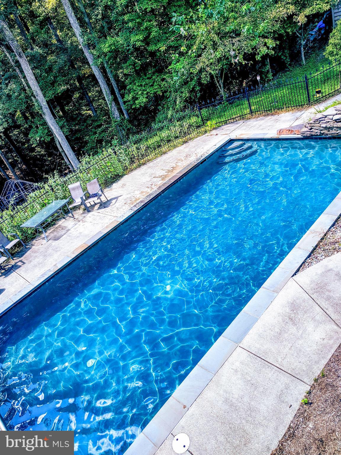 50 Walnut Creek Road Huntingtown, MD 20639 - Photo 8 of 59 Heated pool with electric safety cover