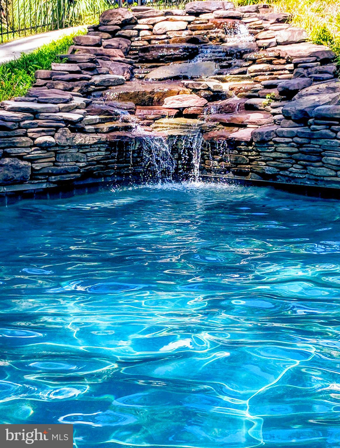 50 Walnut Creek Road Huntingtown, MD 20639 - Photo 9 of 59 Waterfall into the pool
