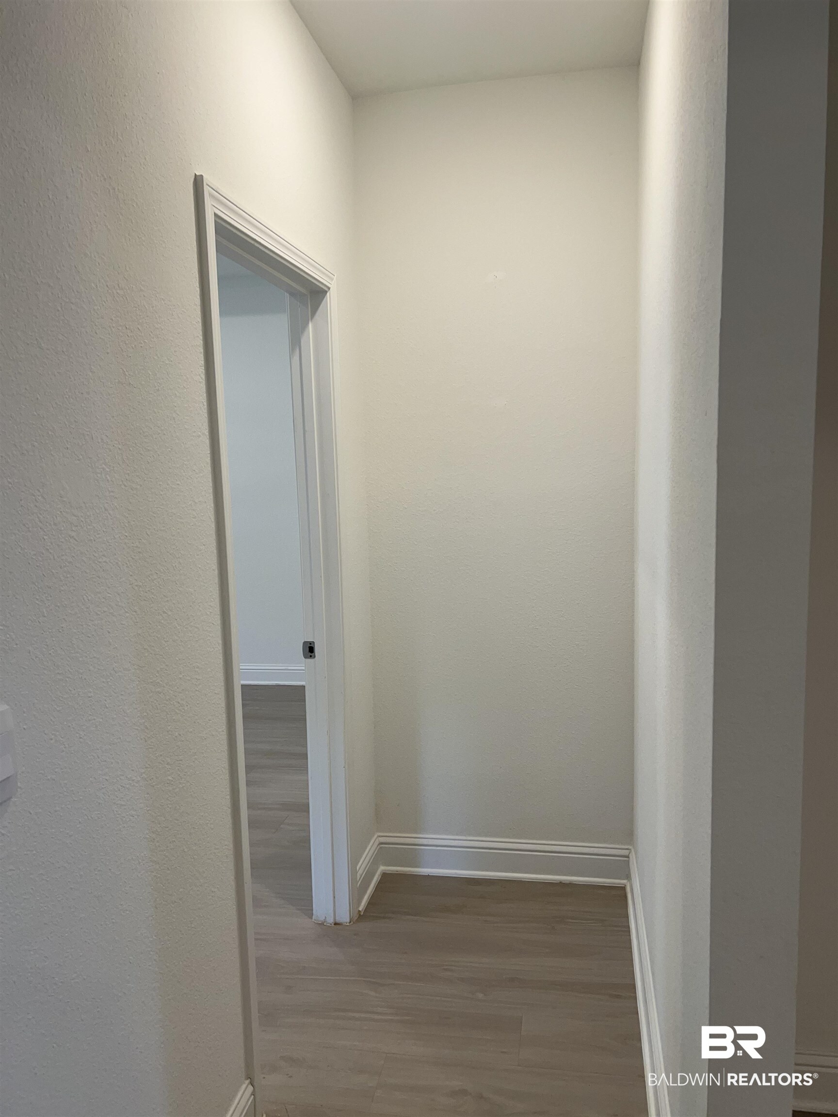 8855 Calverton Street Foley, AL 36535 - Photo 44 of 76 Corridor with hardwood / wood-style floors