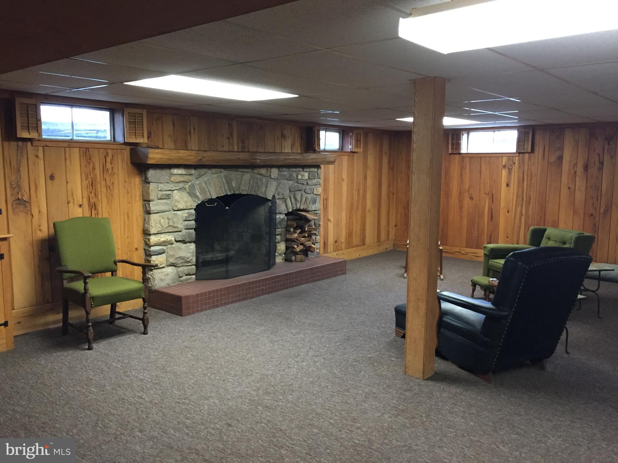 827 Dublin Road Perkasie, PA 18944 - Photo 13 of 18 a living room with furniture and a fireplace