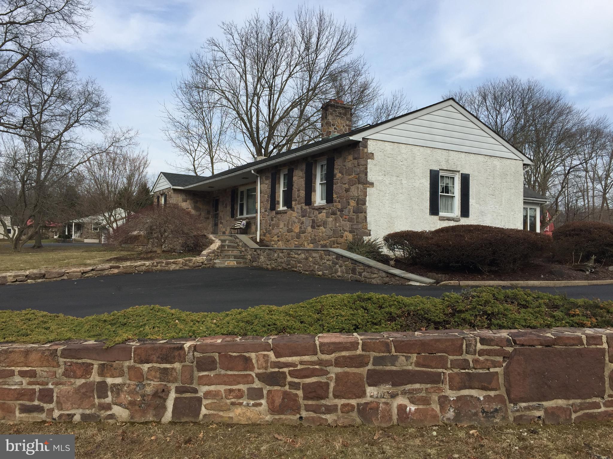 827 Dublin Road Perkasie, PA 18944 - Photo 15 of 18 a front view of a house with a yard