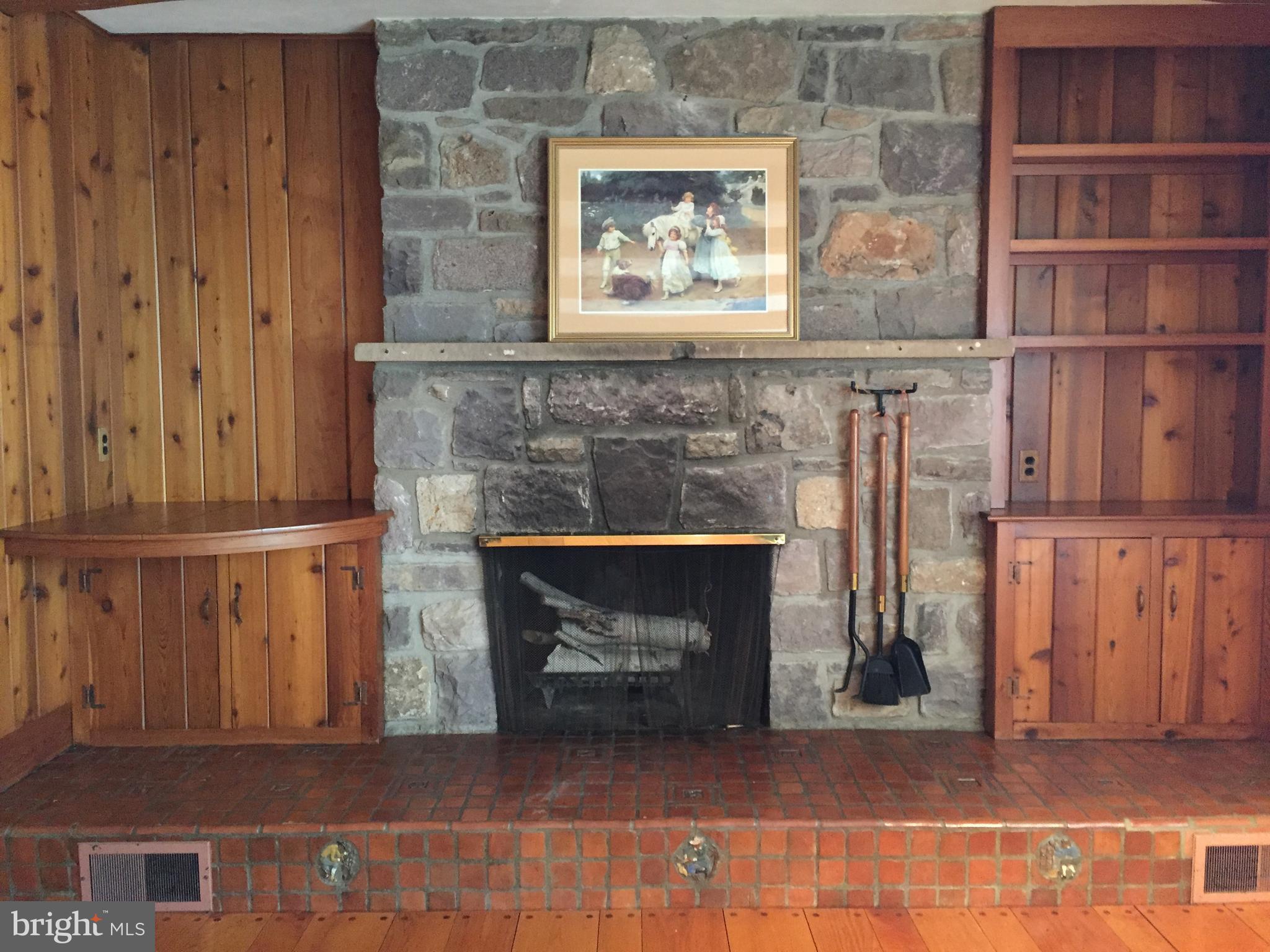 827 Dublin Road Perkasie, PA 18944 - Photo 5 of 18 a living room with a fireplace