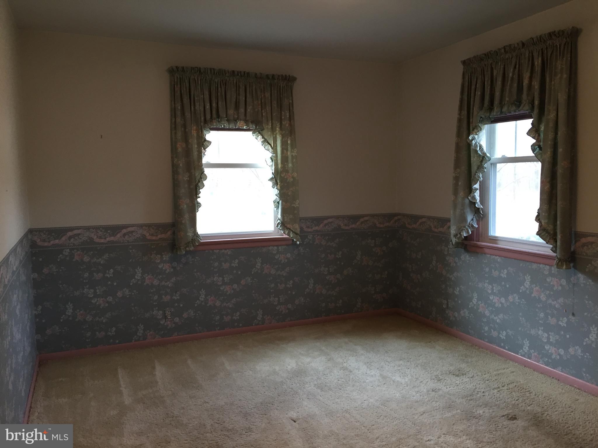 827 Dublin Road Perkasie, PA 18944 - Photo 9 of 18 an empty room with a window