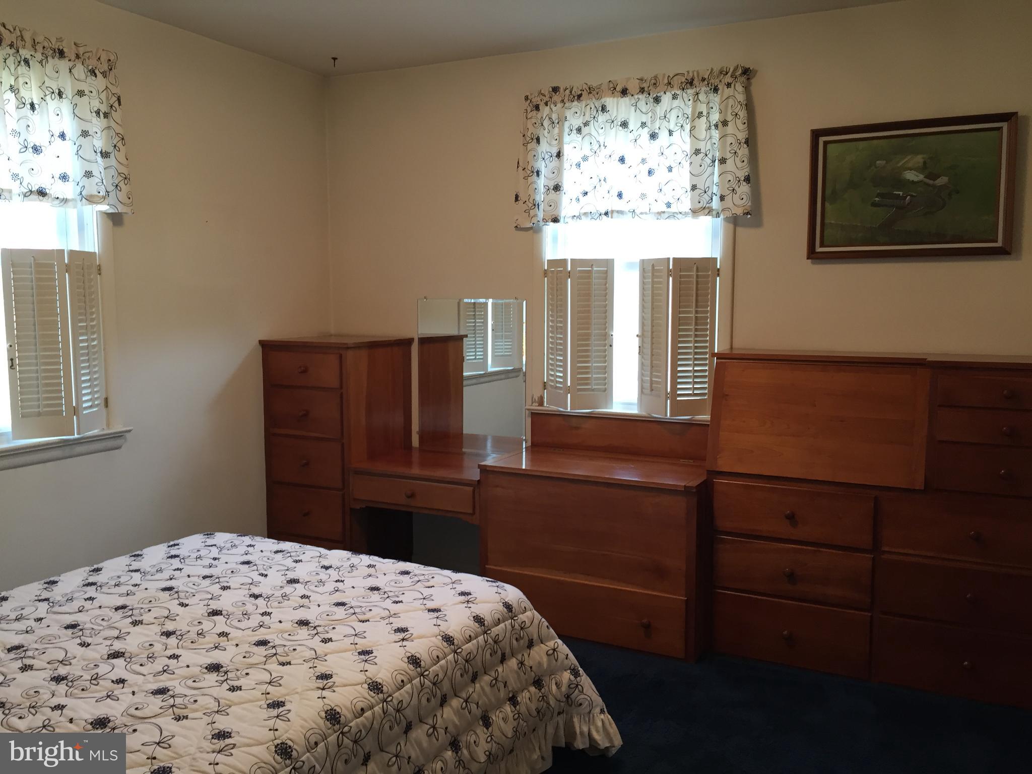 827 Dublin Road Perkasie, PA 18944 - Photo 10 of 18 a bedroom with a bed and a window