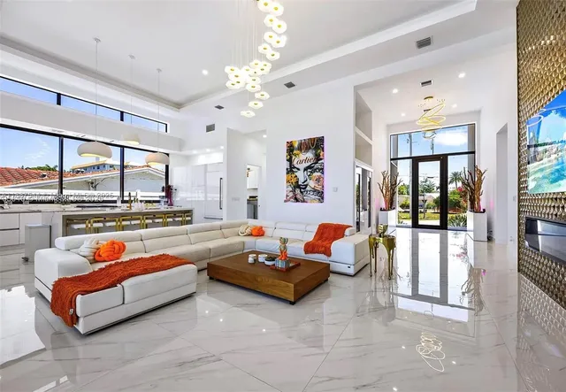 a living room with fireplace furniture and a flat screen tv