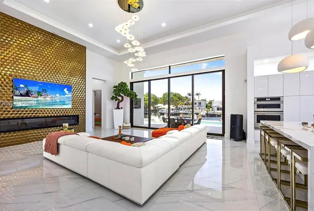 a bedroom with furniture and a large mirror