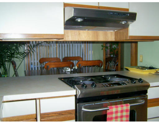 1 Mountain Road, Unit B Gill, MA 01354 - Photo 11 of 30 a stove top oven sitting inside of a kitchen