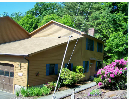 1 Mountain Road, Unit B Gill, MA 01354 - Photo 2 of 30 a house view with a garden