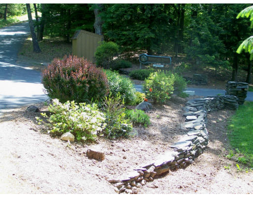 1 Mountain Road, Unit B Gill, MA 01354 - Photo 29 of 30 a backyard of a house with a yard and outdoor seating