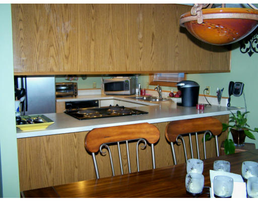 1 Mountain Road, Unit B Gill, MA 01354 - Photo 8 of 30 a kitchen with a table chairs and a stove