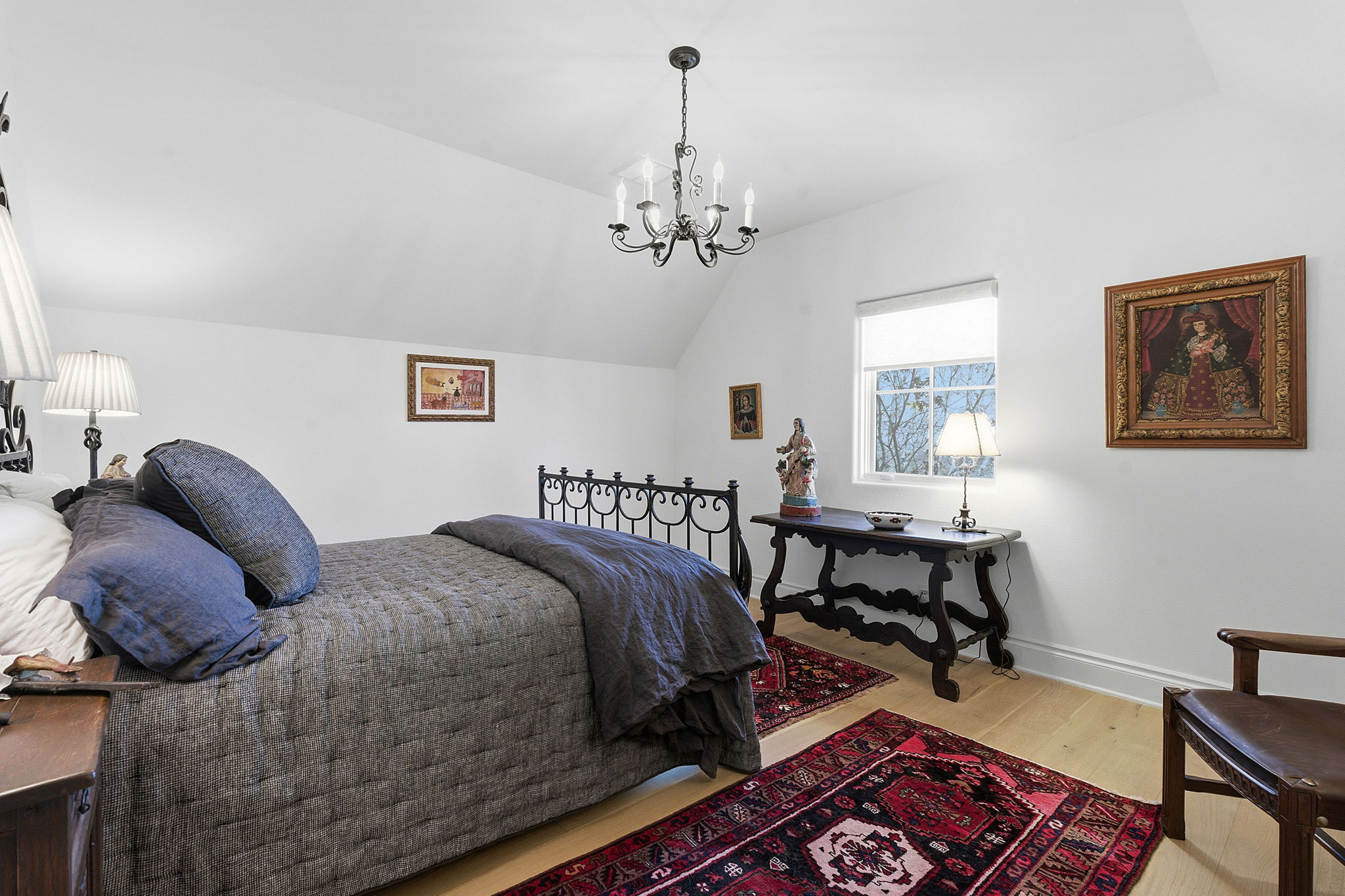 16400 Hamilton Pool Road Austin, TX 78738 - Photo 21 of 37 a bedroom with a bed furniture and window