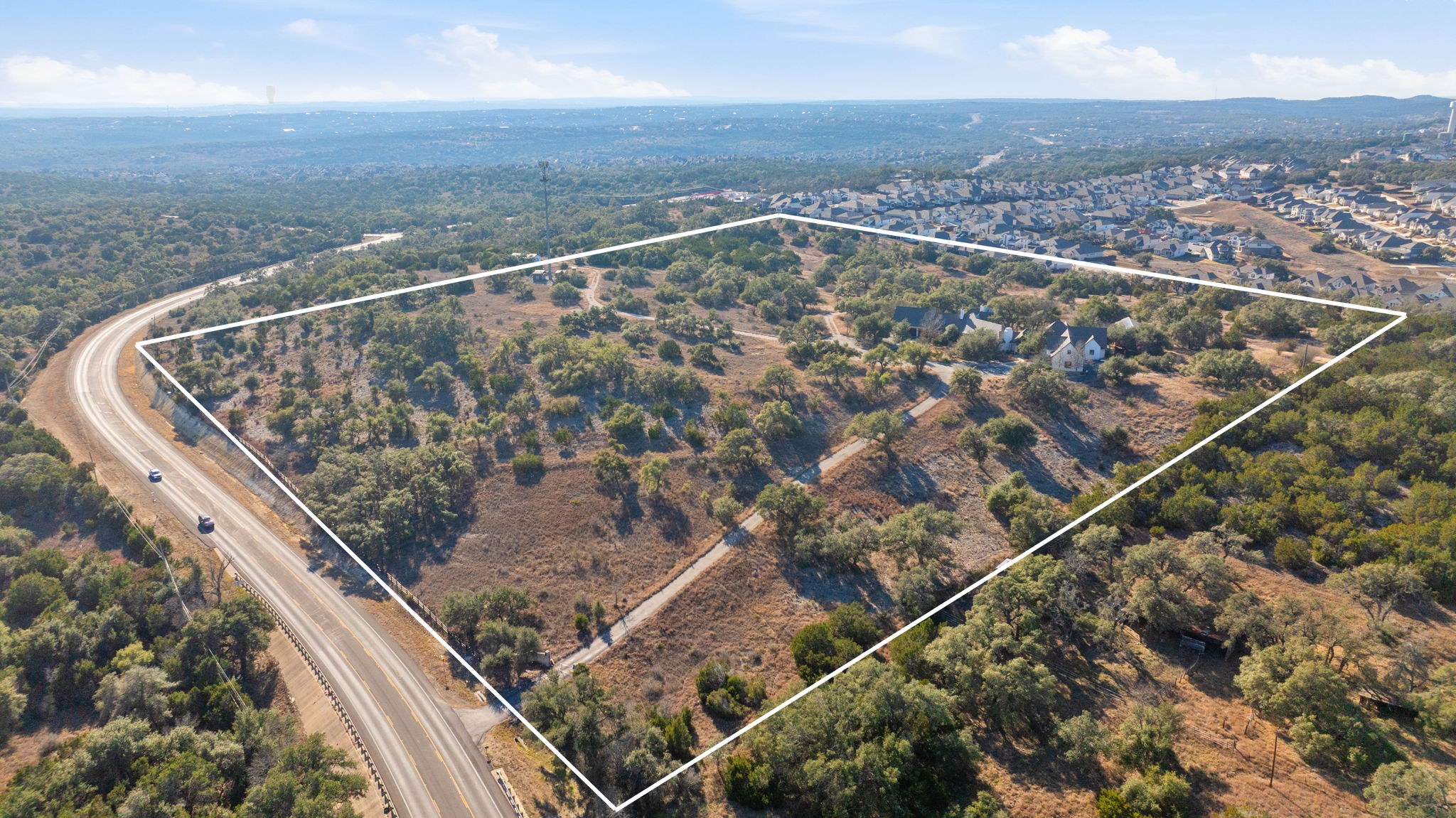 16400 Hamilton Pool Road Austin, TX 78738 - Photo 3 of 37 a view of a balcony with an ocean