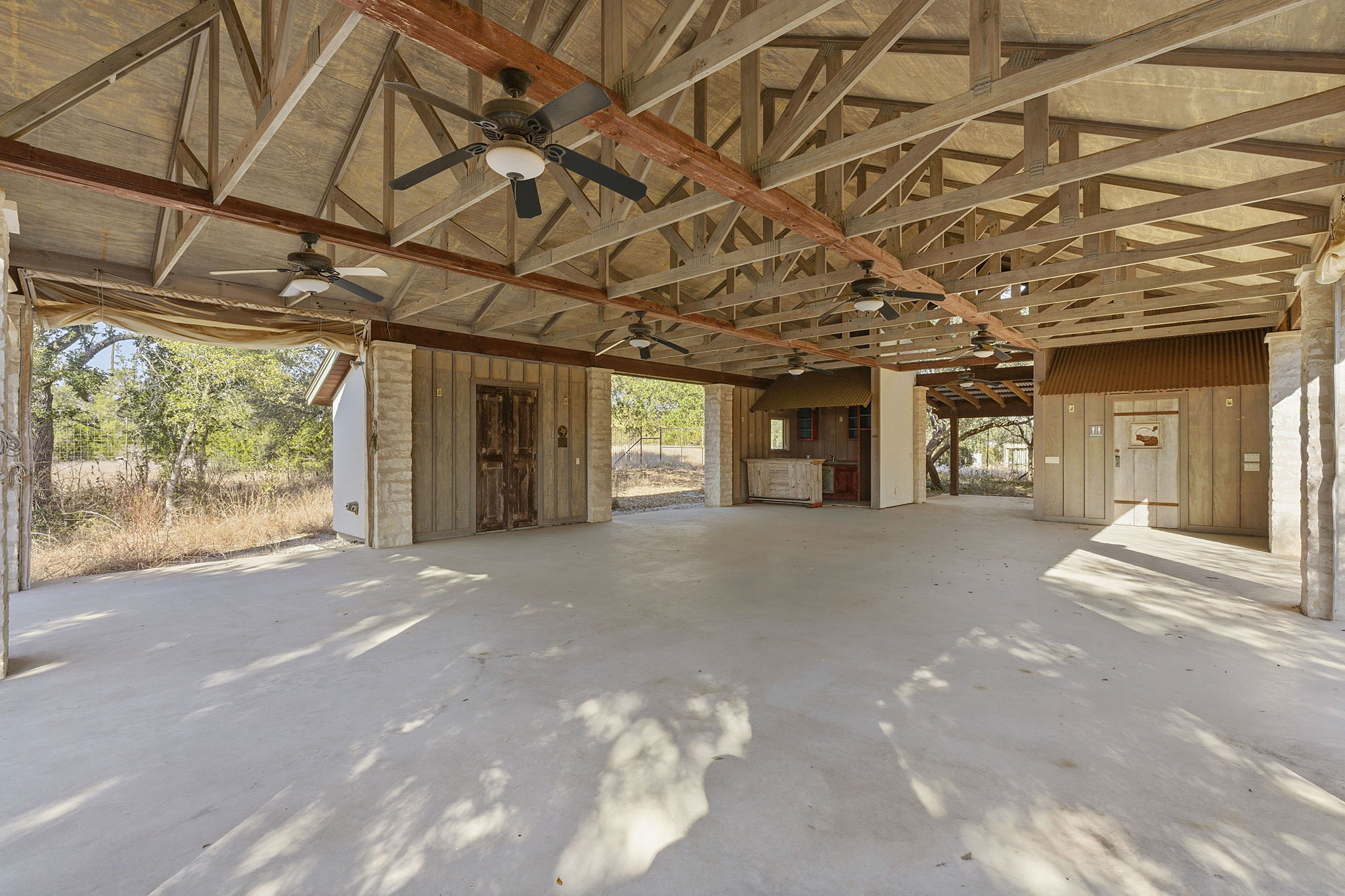 16400 Hamilton Pool Road Austin, TX 78738 - Photo 31 of 37 a view of a room with wooden walls