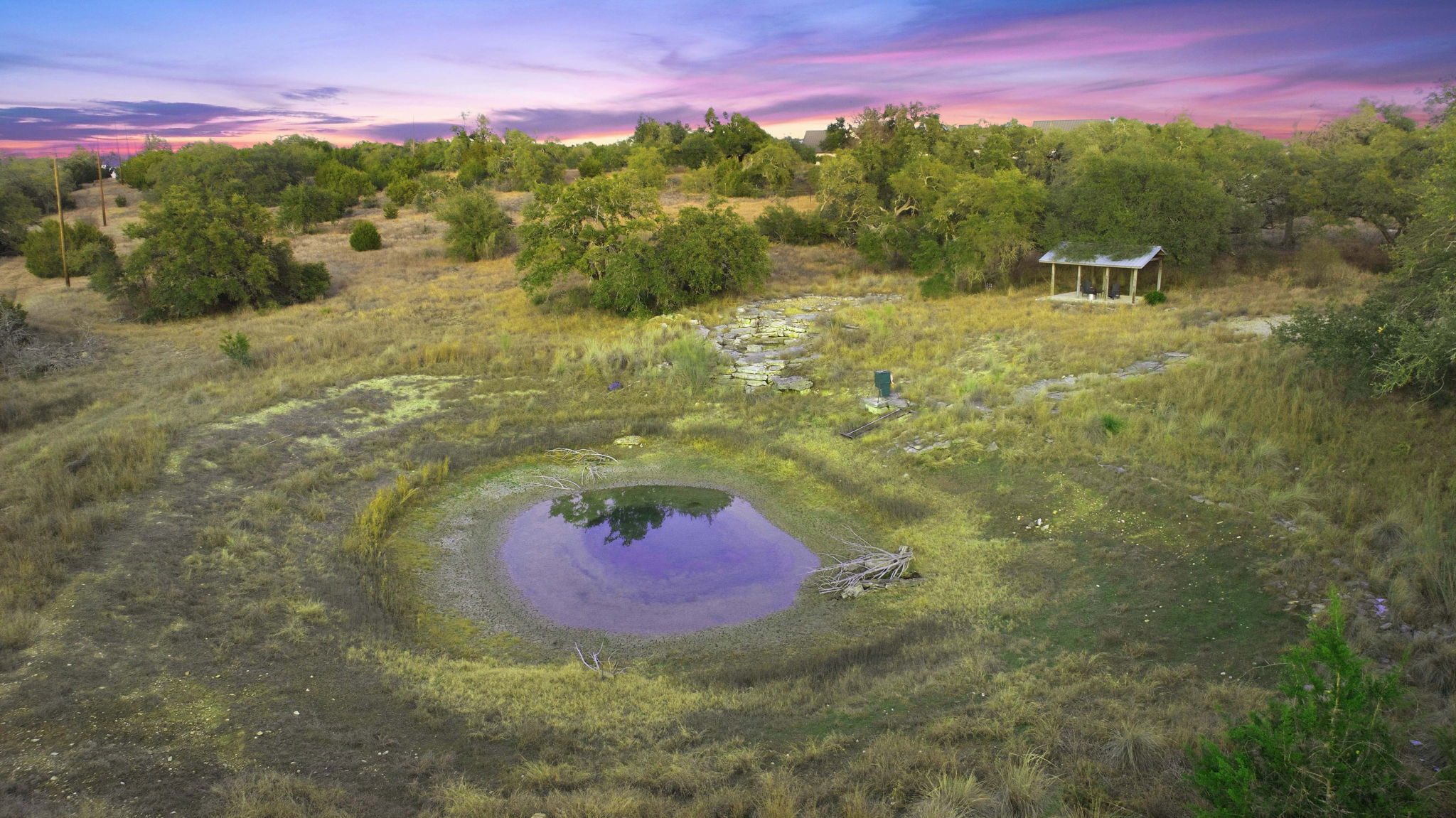 16400 Hamilton Pool Road Austin, TX 78738 - Photo 35 of 37 a view of a lush green field