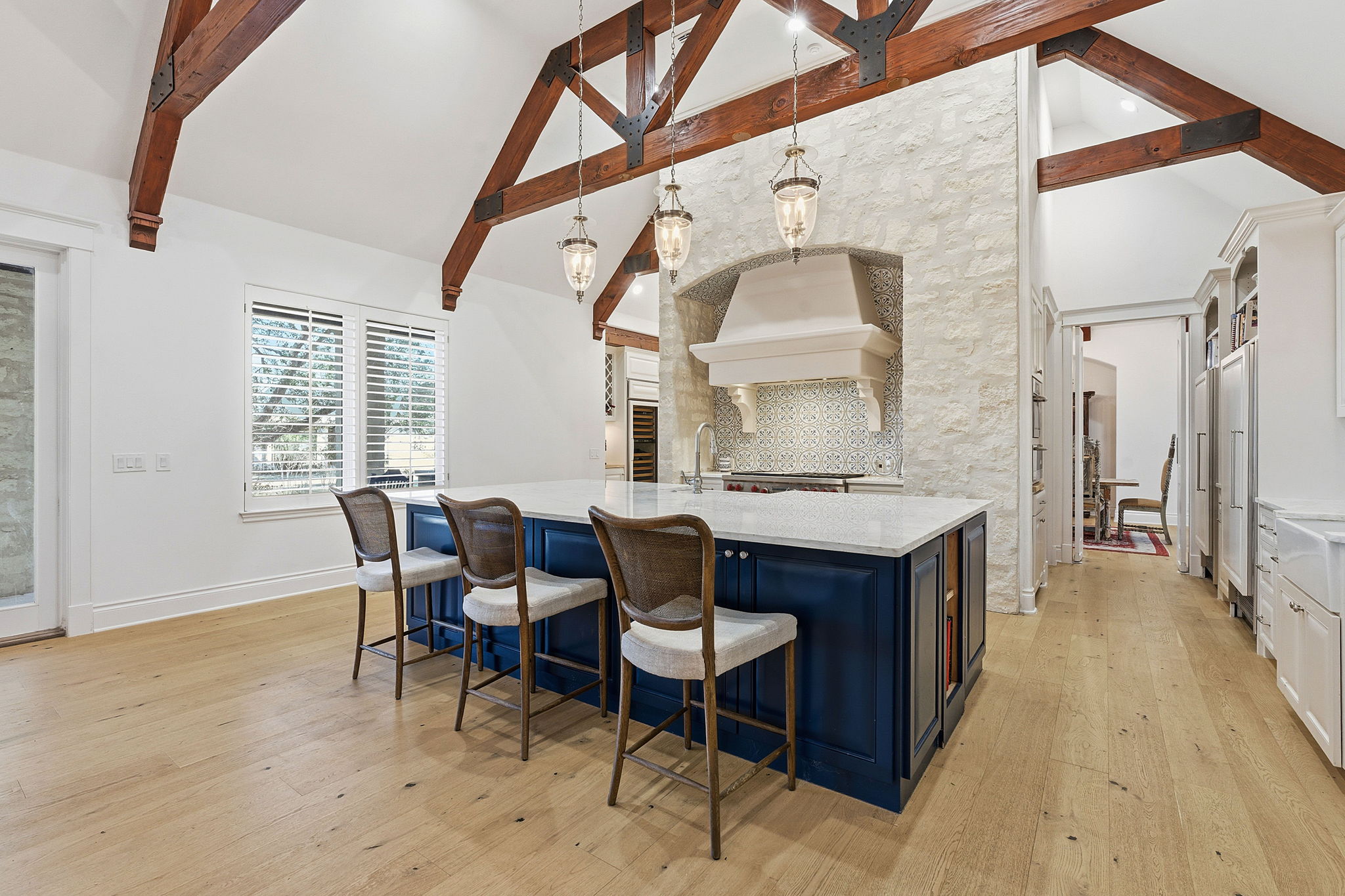 16400 Hamilton Pool Road Austin, TX 78738 - Photo 7 of 37 a view of a dining room with furniture and wooden floor