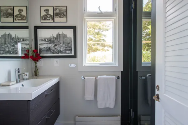 a view of a dining room with furniture and window