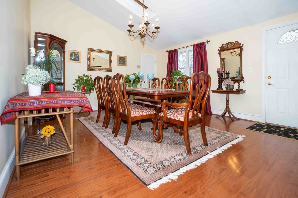 23 Grove Road Natick, MA 01760 - Photo 1 of 14 a view of a dining room with furniture