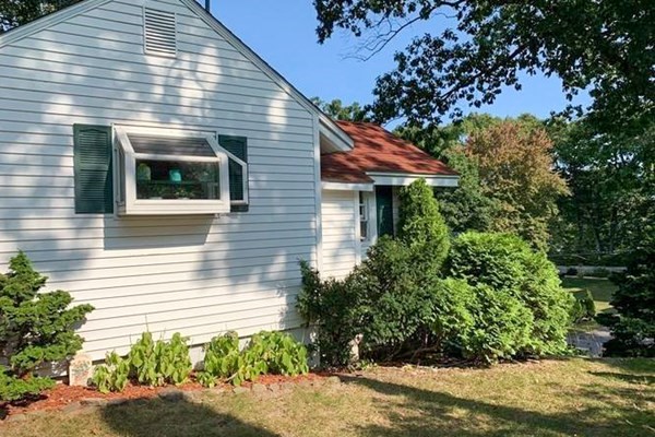 23 Grove Road Natick, MA 01760 - Photo 13 of 14 a view of a house with a yard