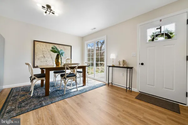 a workspace with furniture window and wooden floor