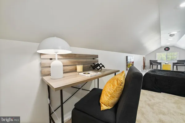 a bed room with a bed and a table