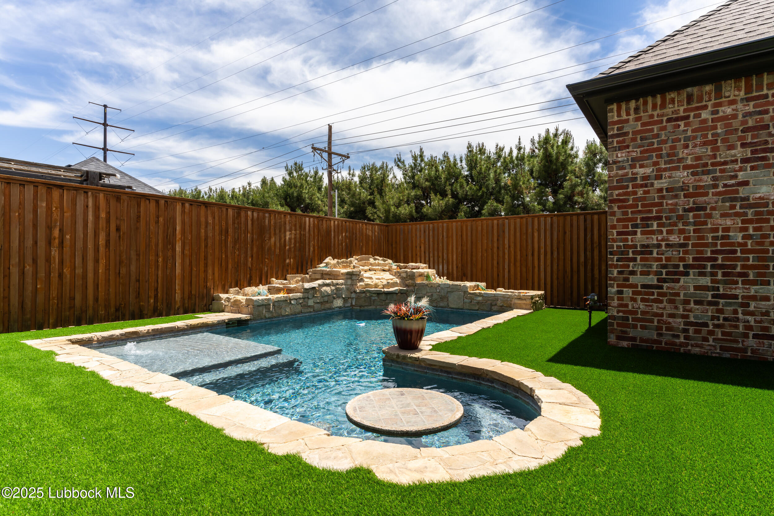 3913 106th Street Lubbock, TX 79423 - Photo 13 of 80 a backyard of a house with yard fire pit and outdoor seating