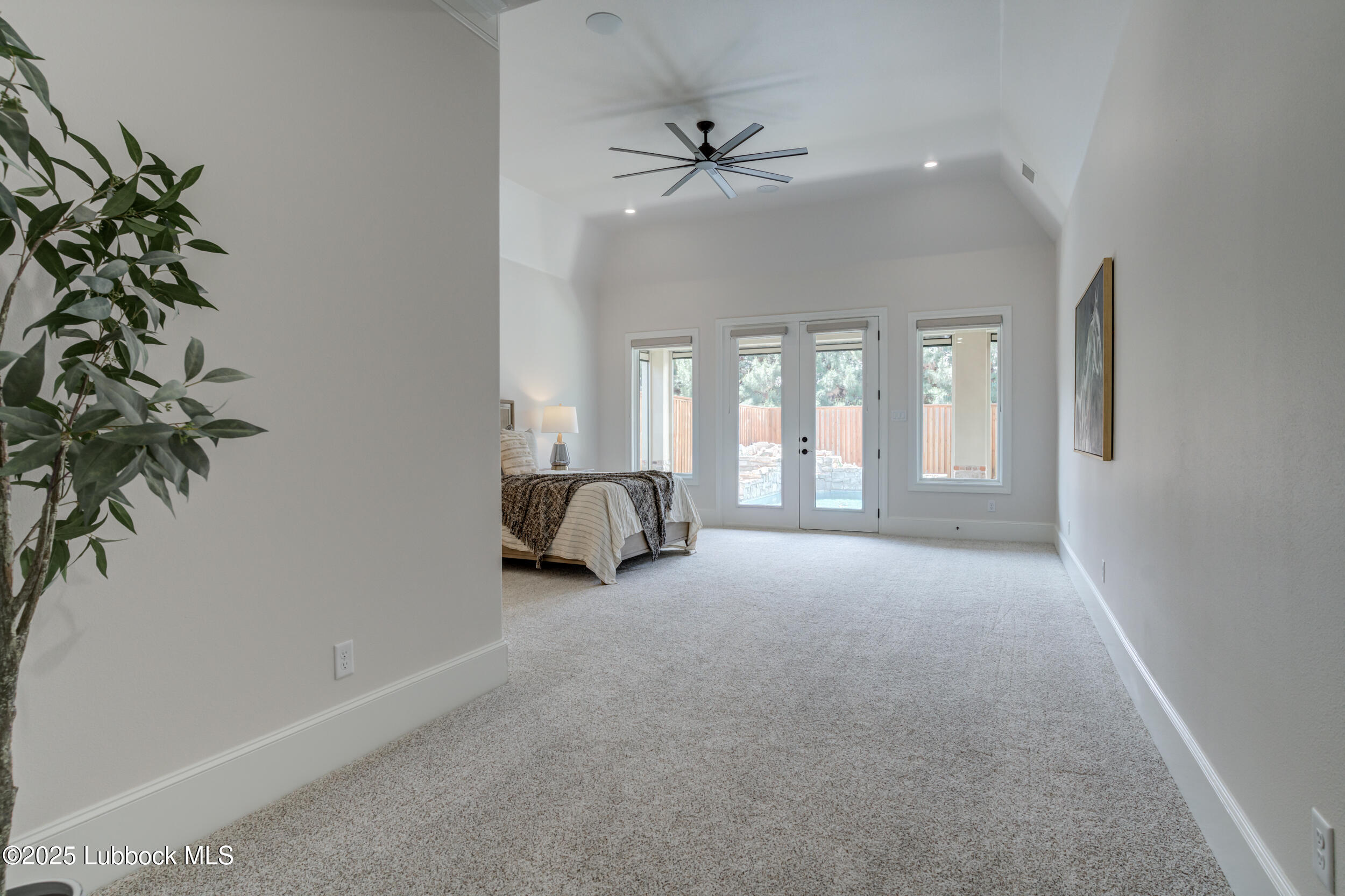 3913 106th Street Lubbock, TX 79423 - Photo 48 of 80 a view of a livingroom with a ceiling fan and window