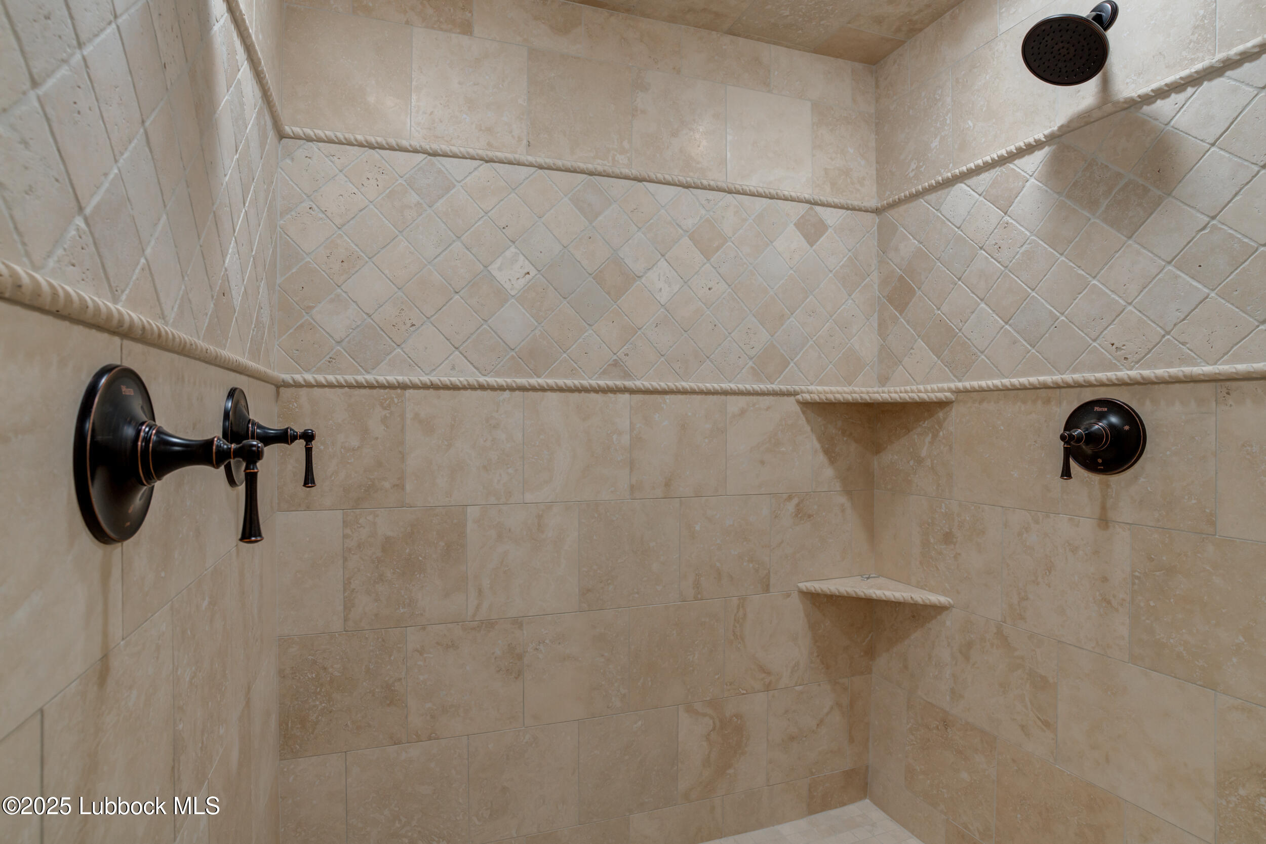 3913 106th Street Lubbock, TX 79423 - Photo 59 of 80 a close view of a shower in the bathroom