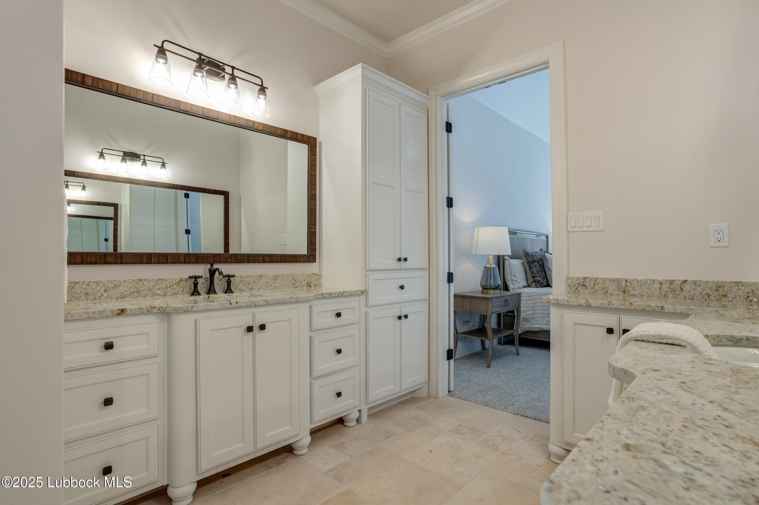 3913 106th Street Lubbock, TX 79423 - Photo 60 of 80 a spacious bathroom with a granite countertop sink and a mirror
