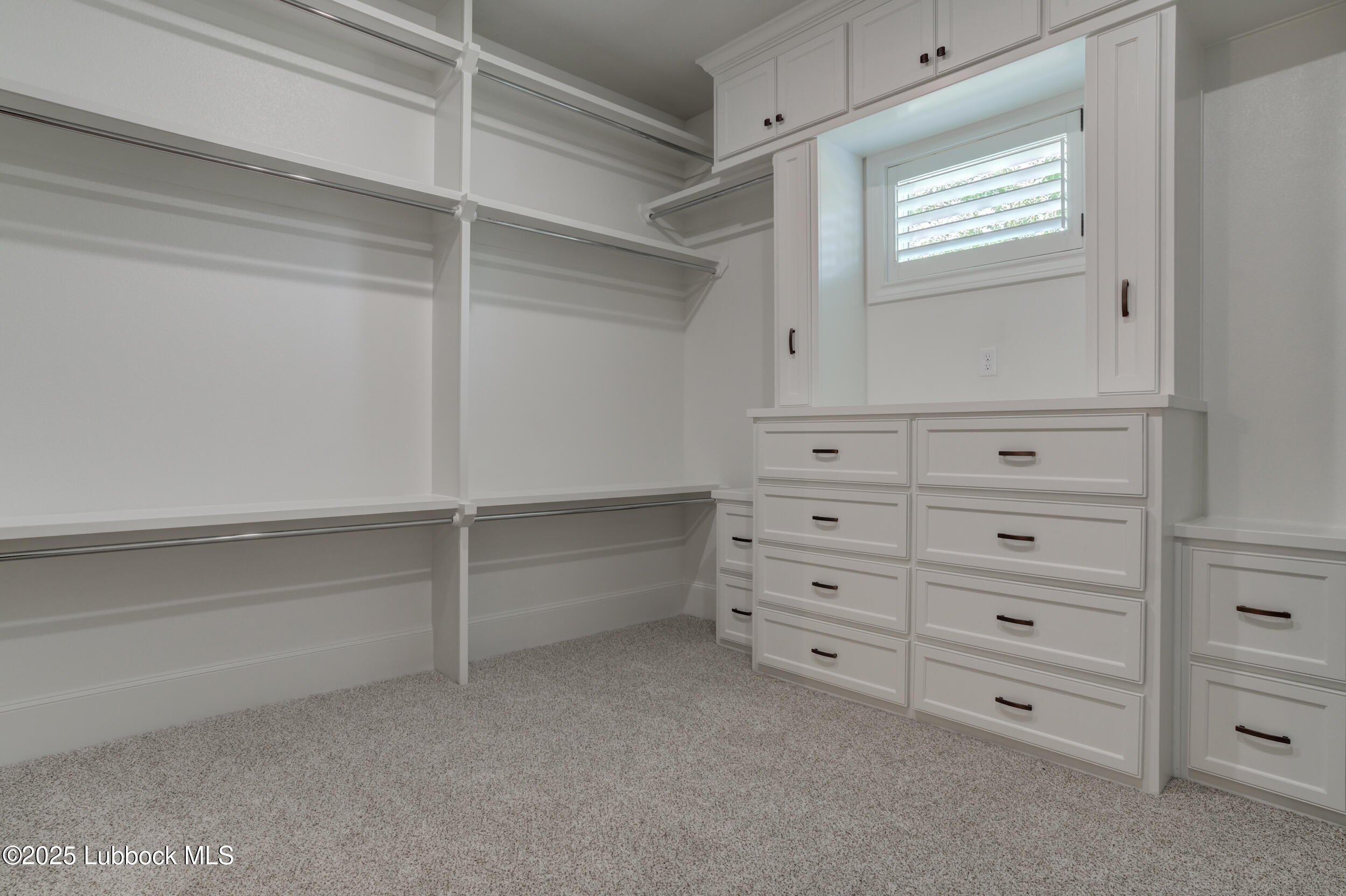 3913 106th Street Lubbock, TX 79423 - Photo 62 of 80 a view of an empty walk in closet