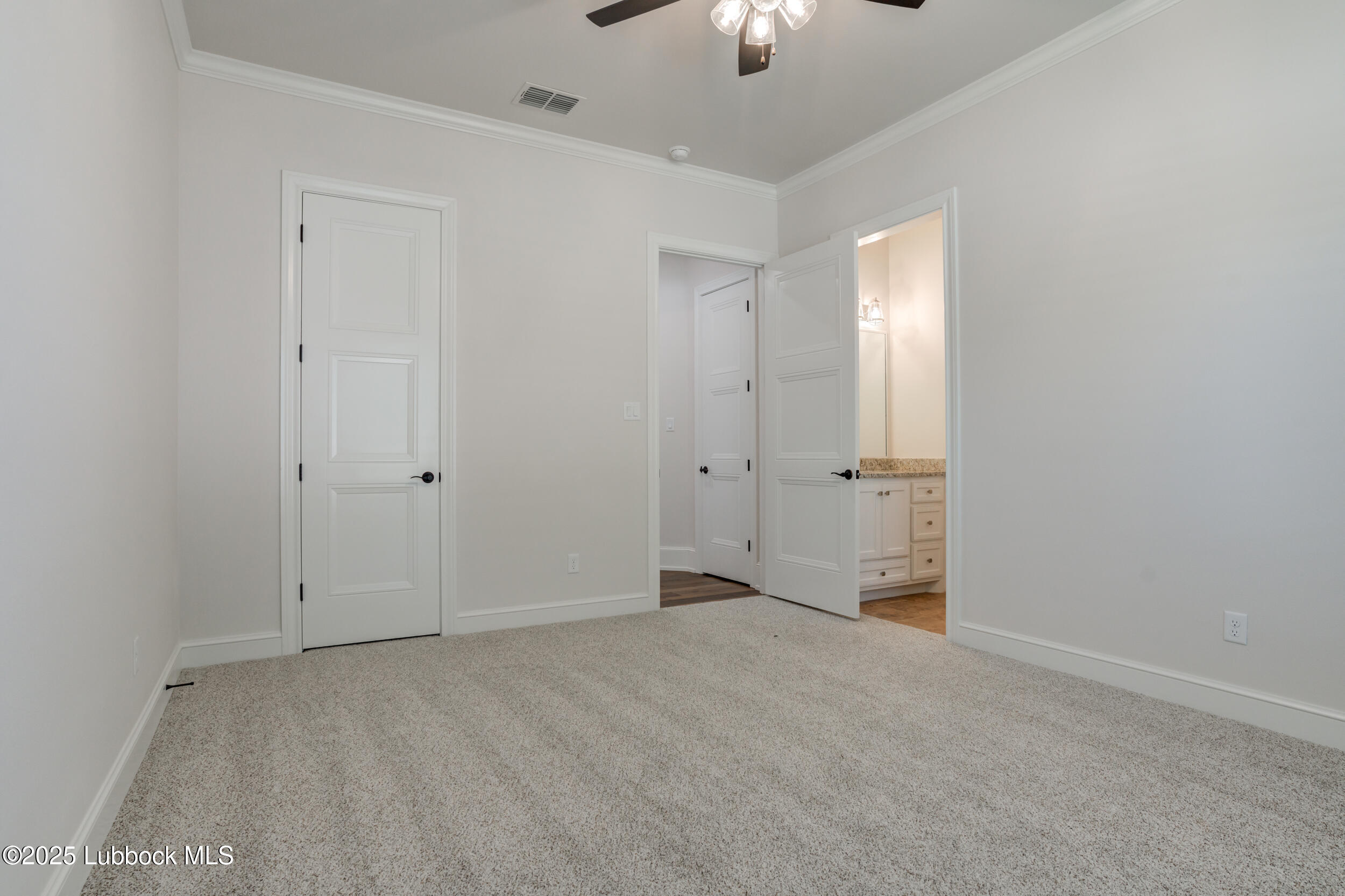 3913 106th Street Lubbock, TX 79423 - Photo 64 of 80 an empty room with chandelier fan