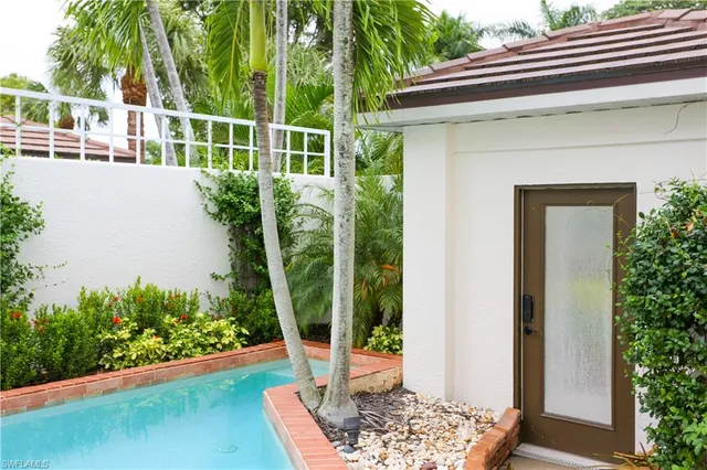 a house view with a garden space