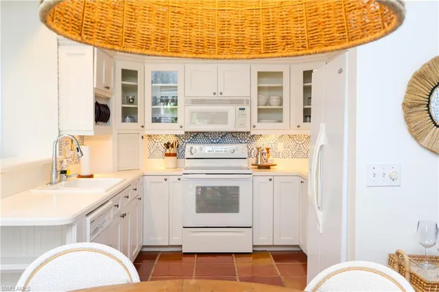 a bathroom with a sink a mirror and a shower