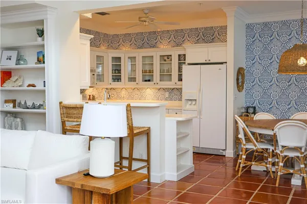a table and chairs in a kitchen