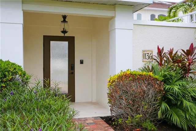 a view of a porch with plants