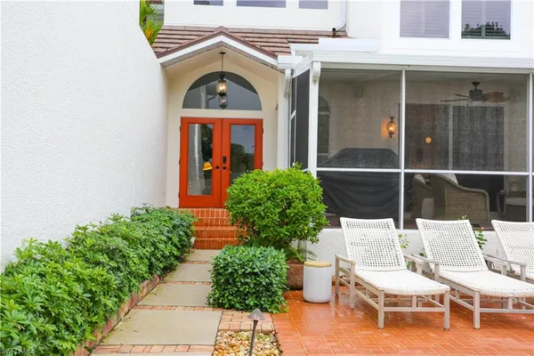 a view of a two chair in the patio