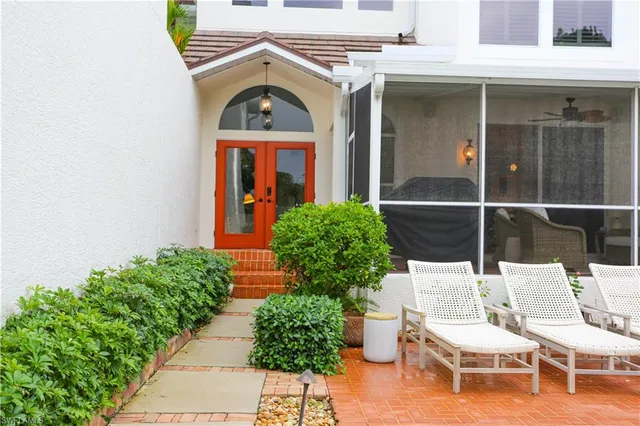 a view of a two chair in the patio