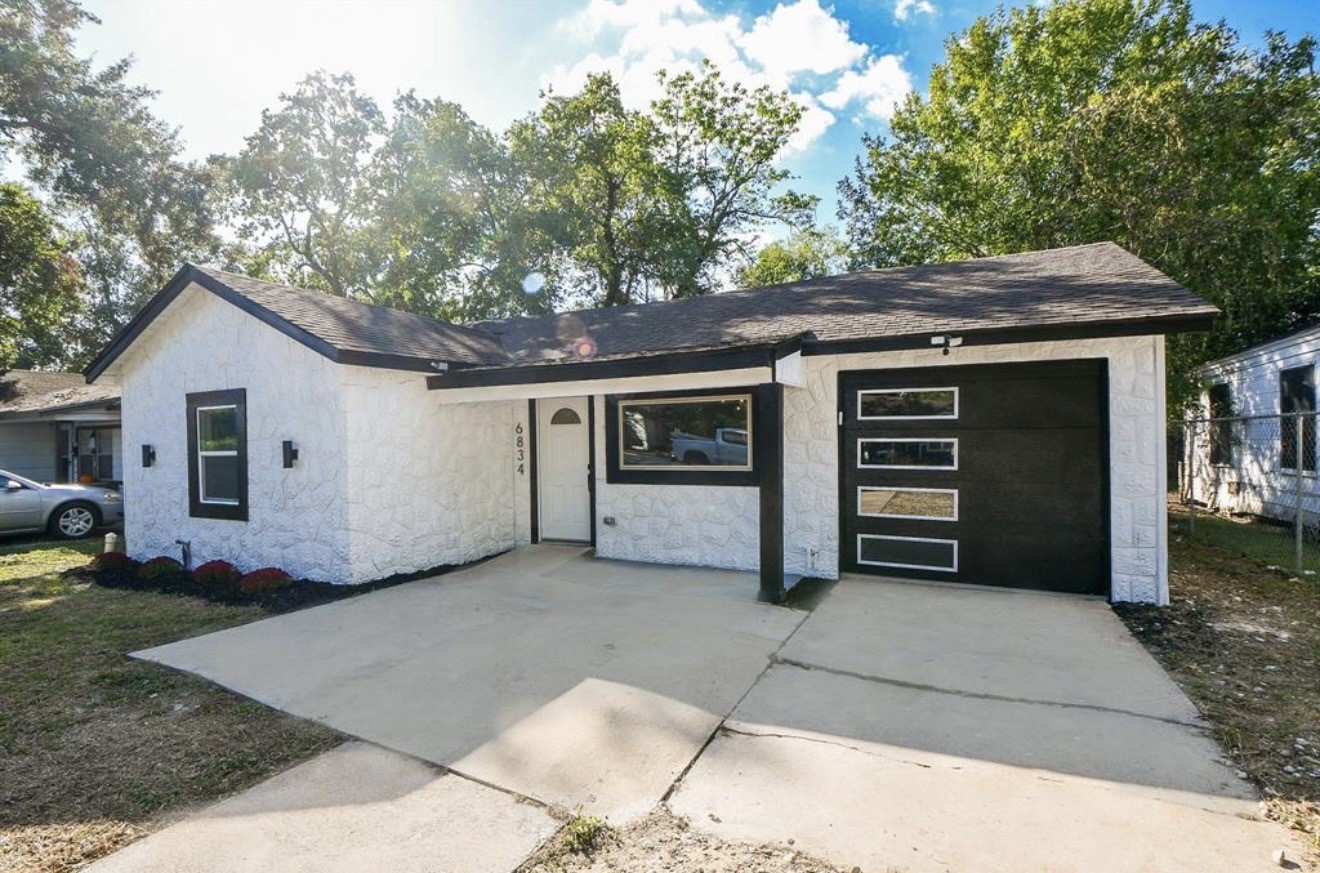 6834 St Augustine Street Houston, TX 77021 - Photo 21 of 21 a view of a house with a yard
