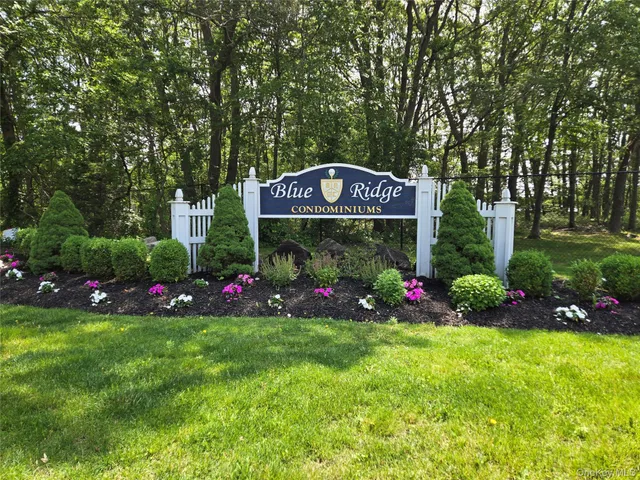 a view of a sign in front of a house