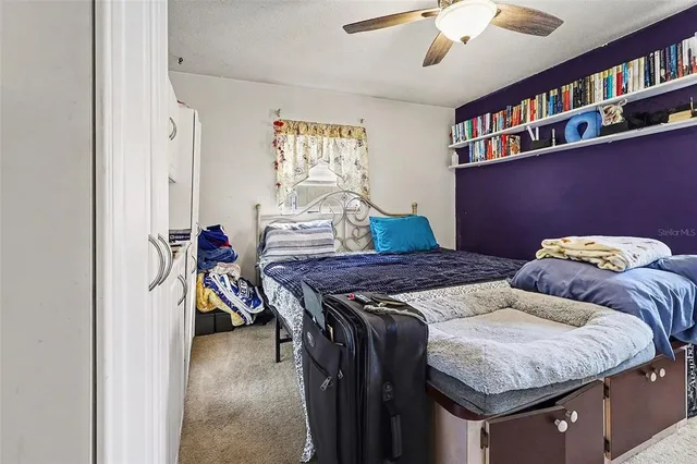 a living room with furniture and flat screen tv