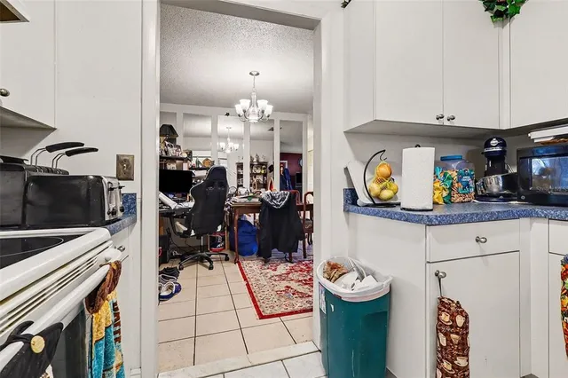 a view of a workspace with furniture